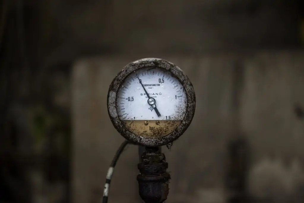 Deflating a Basketball With an Air Pressure Gauge